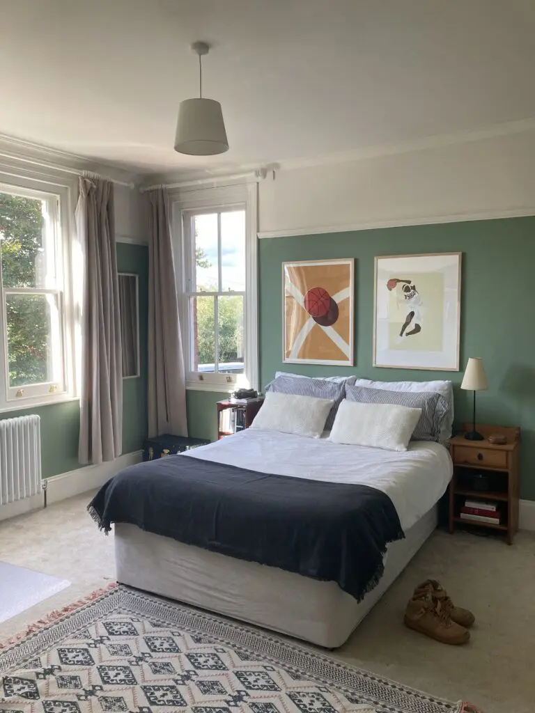 a bedroom with a large bed in a room