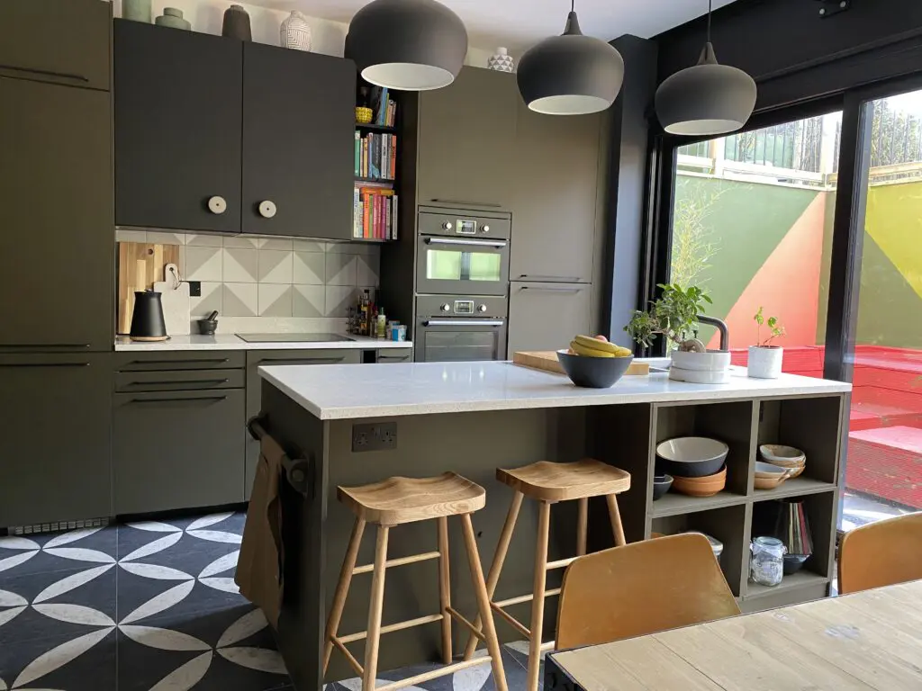a kitchen with a dining room table