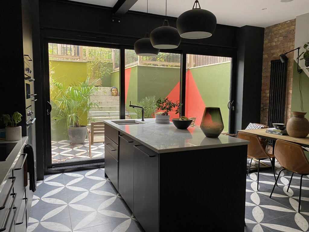 a dining room table in front of a window