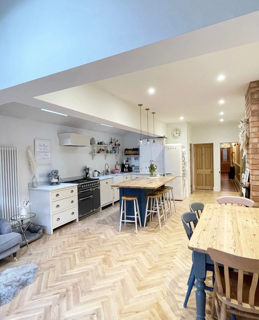 a kitchen with a dining room table