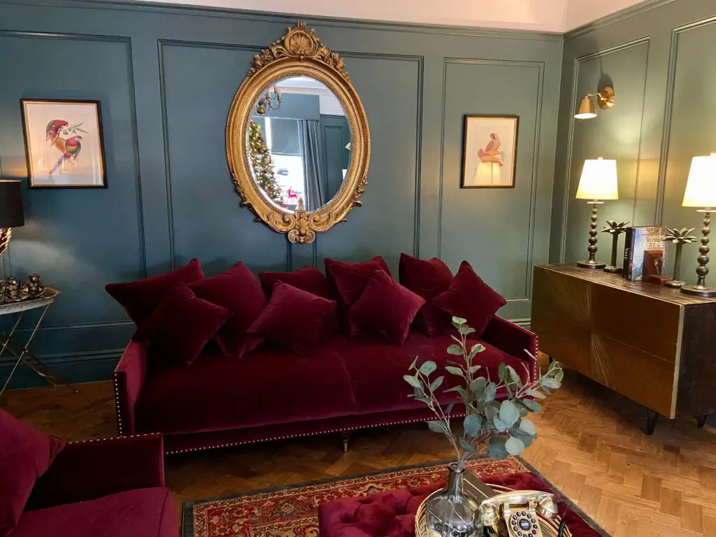 a living room filled with furniture and a fire place