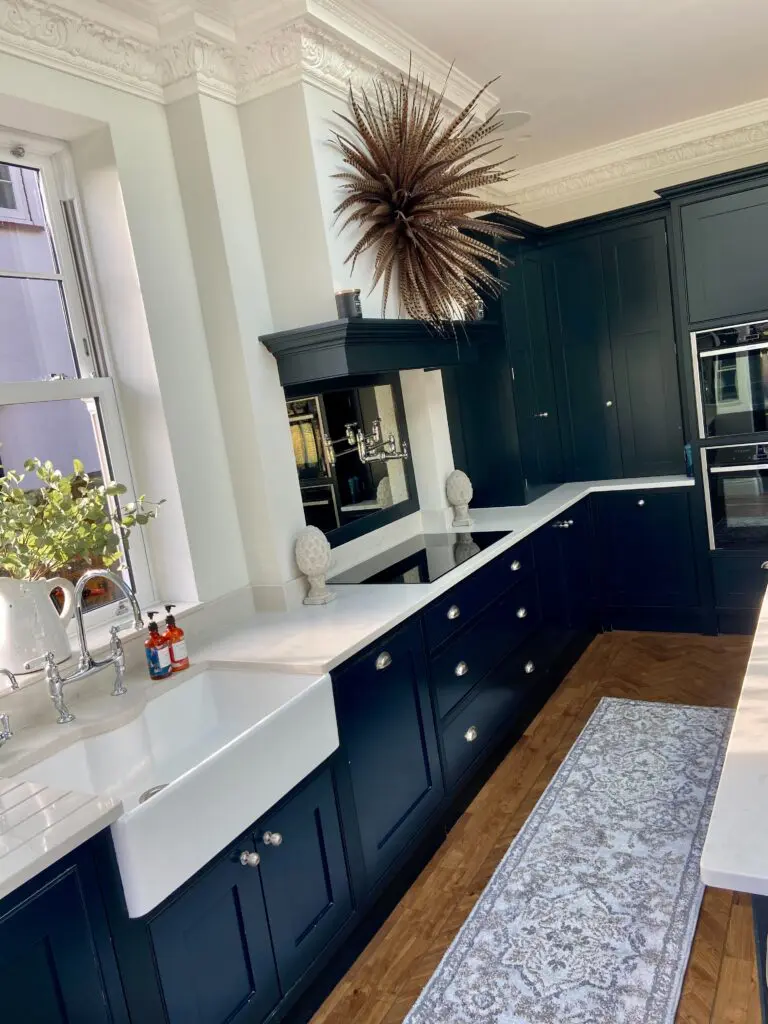 a room filled with furniture and a large window