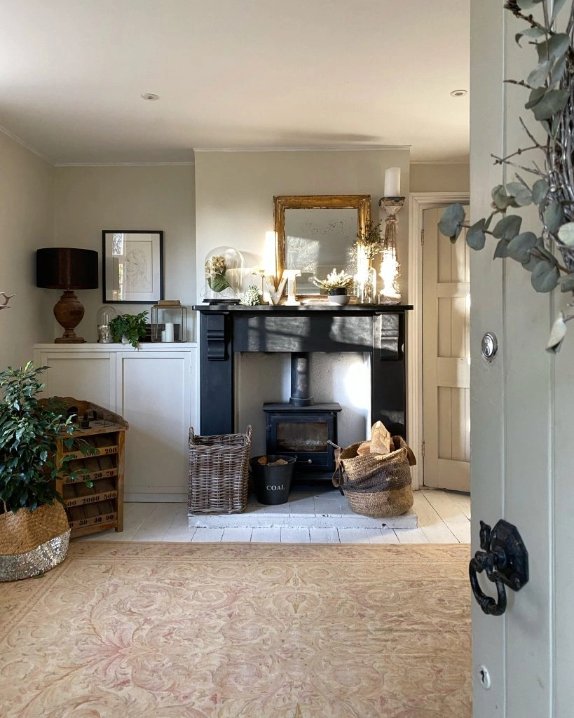a living room filled with furniture and a fireplace