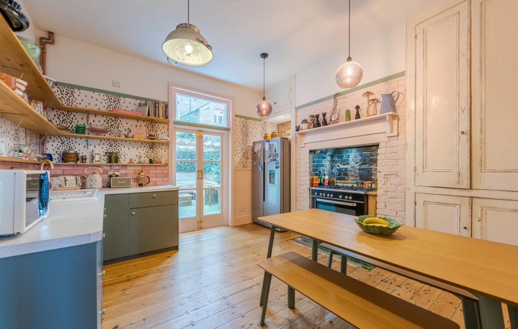 a kitchen with an island in the middle of a room