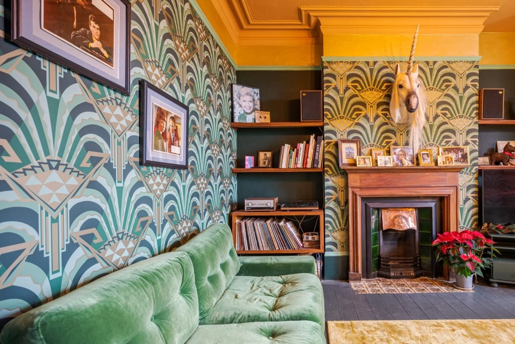 a colorful living room with a fireplace