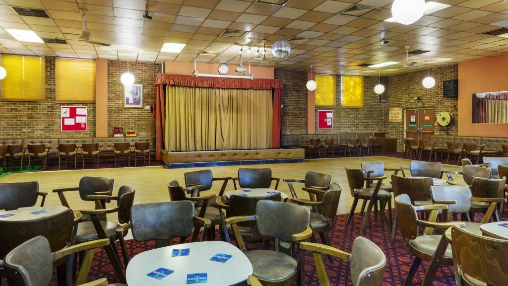 a room filled with furniture and a table in a restaurant