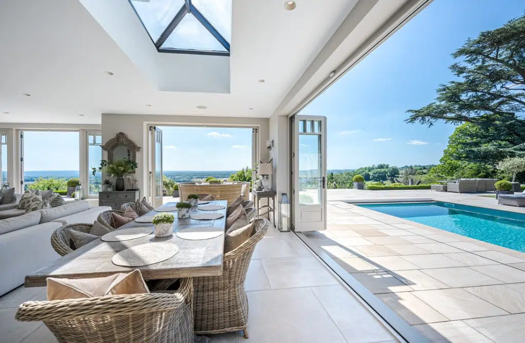 a room filled with furniture and a large window