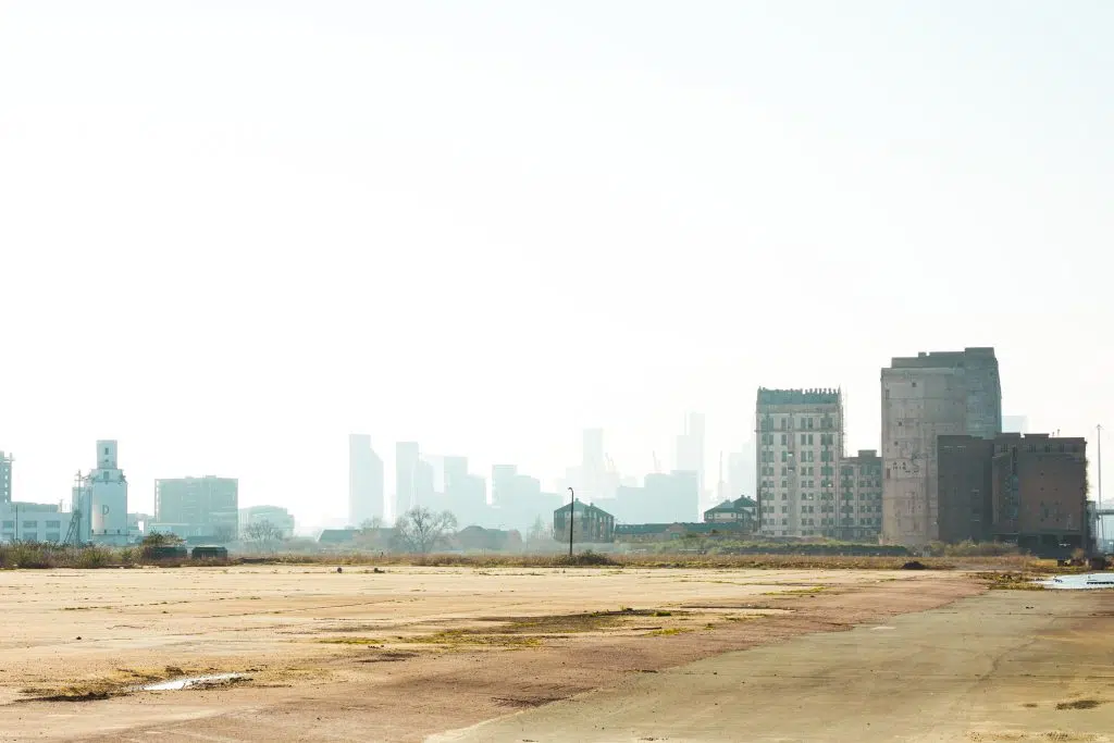 a beach with a city in the background