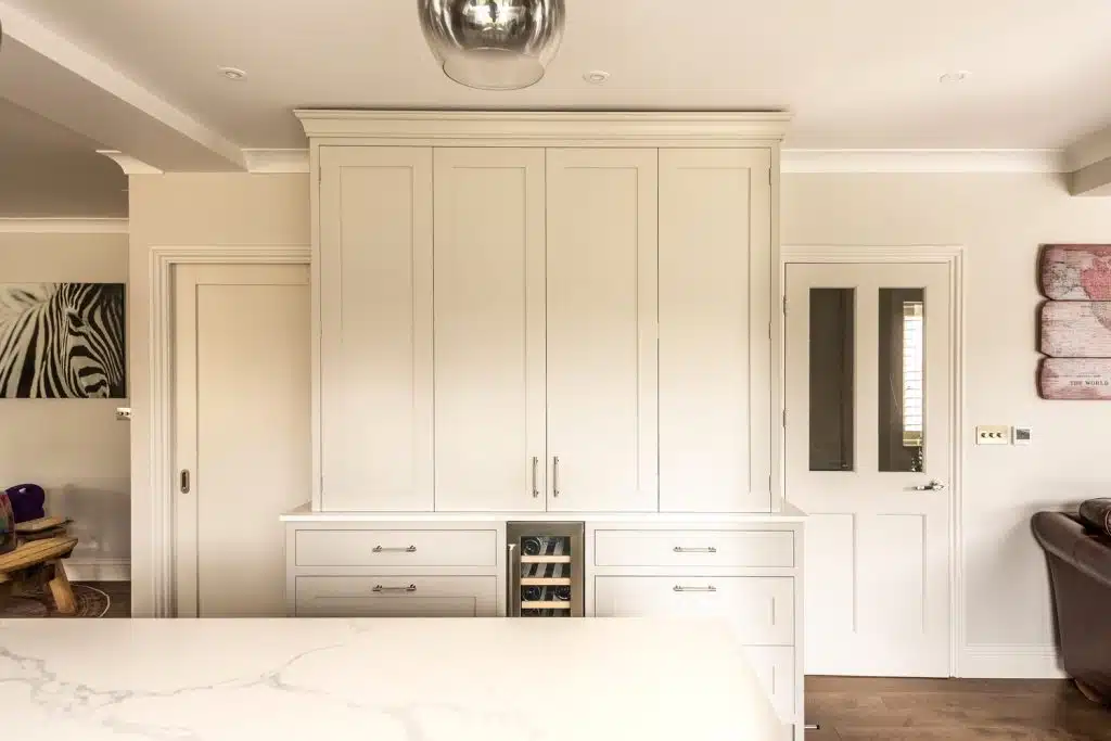 a kitchen with a large bed in a room