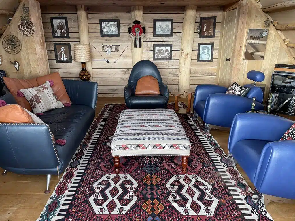 a living room with a leather chair