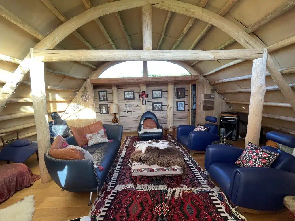 a room filled with furniture and a fireplace