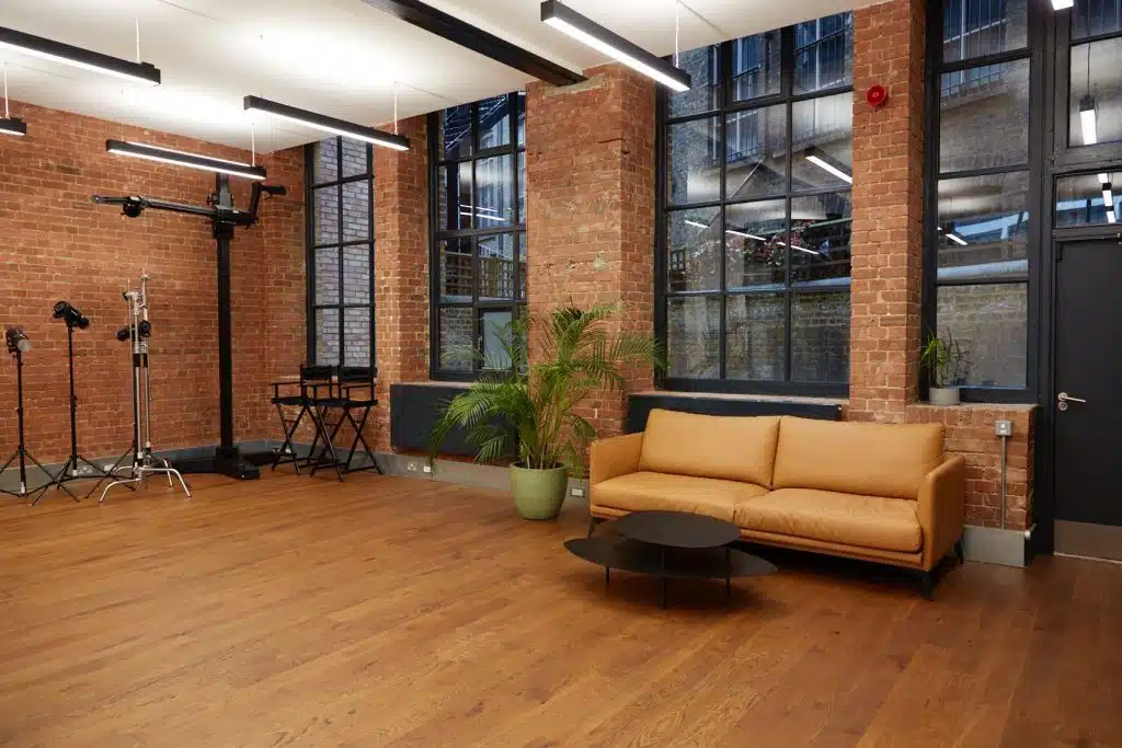 a living area with a building in the background