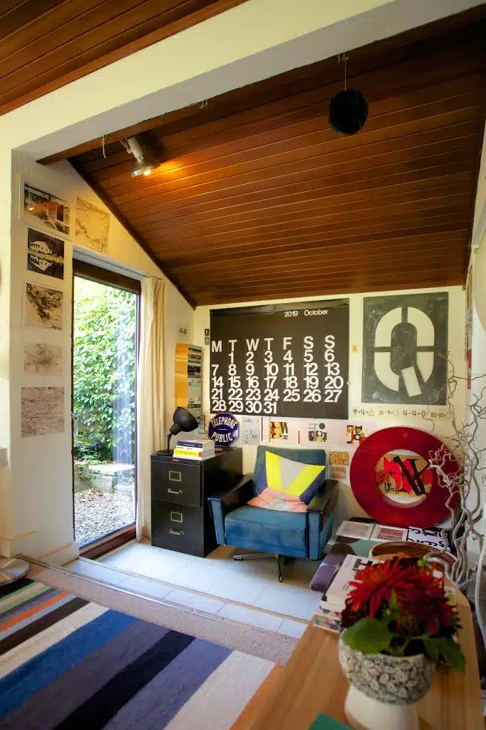 a living room filled with furniture and a fire place