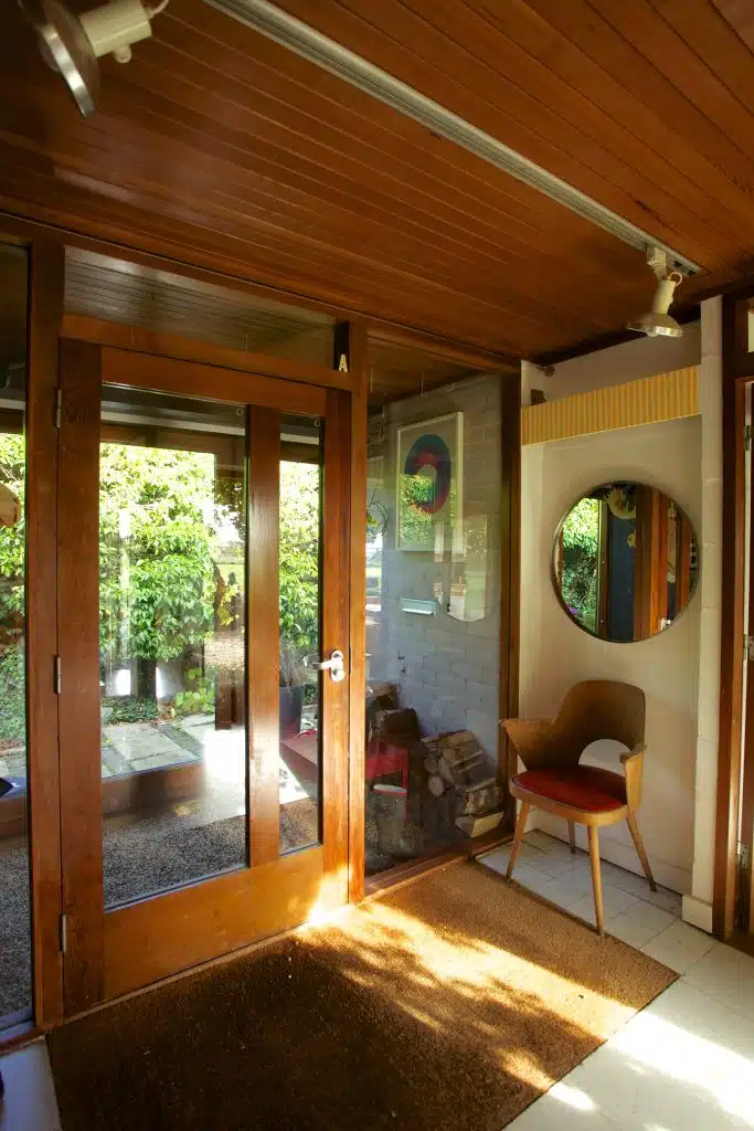 a room filled with furniture and a large window