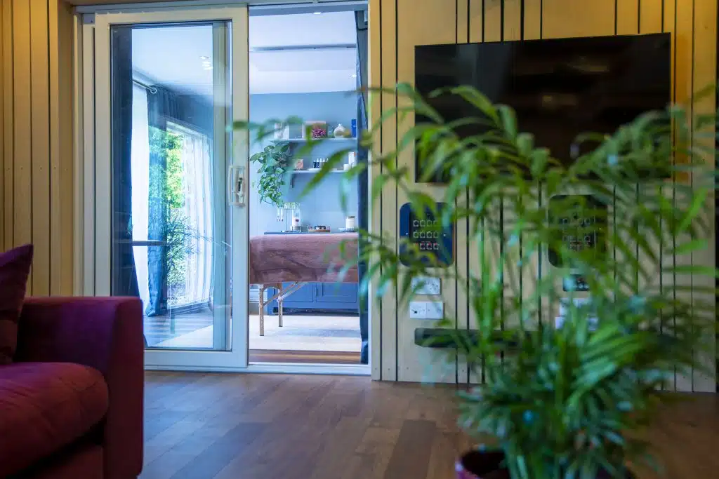 a living room next to a window