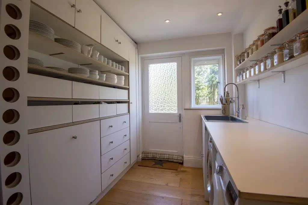 a kitchen with a sink and a window