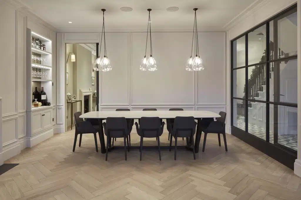 a living room filled with furniture and a large window